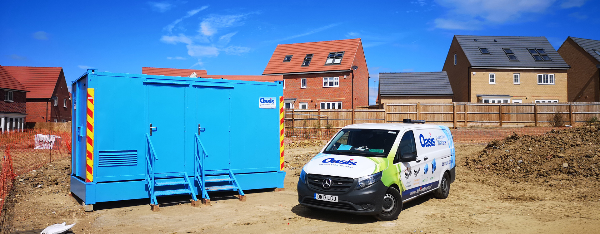Oasis Vision toilet block on site with van